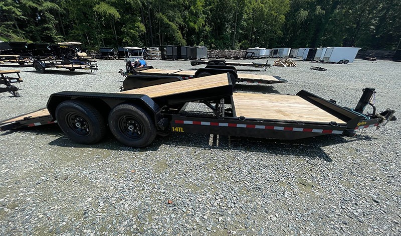 Big Tex 14TL partial tilt equipment trailer with the front deck flat and the rear deck tilted down