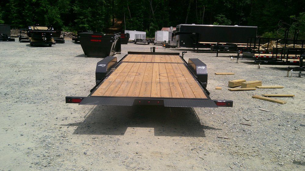 Treated wood deck and crossmembers on a Nolan 7x22 equipment trailer at NC Trailers