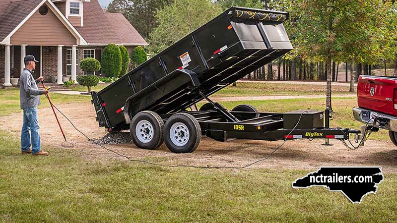 Big Tex 10SR dump trailer dumping a load of gravel
